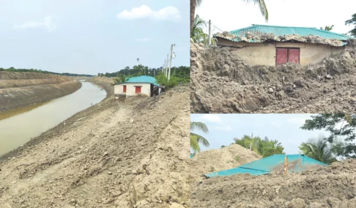 খুলনায় নদী খননের মাটিতে চাপা পড়ছে আশ্রয়ণ প্রকল্পের ঘর